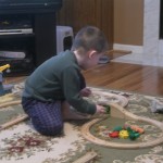 Christopher building trains!