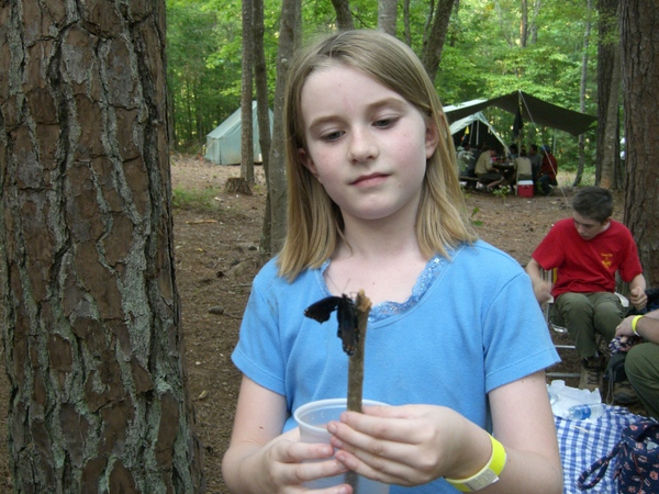 Anna holding a newborn butterfly