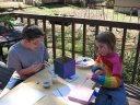 Joshua and Anna doing Lenten craft